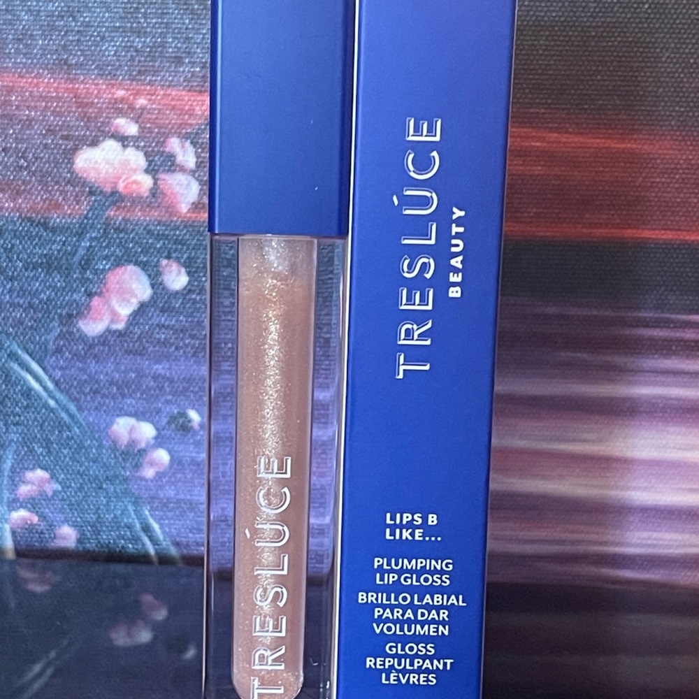 TRESLUCE LIP PLUMPING GLOSS IN DAZZLING